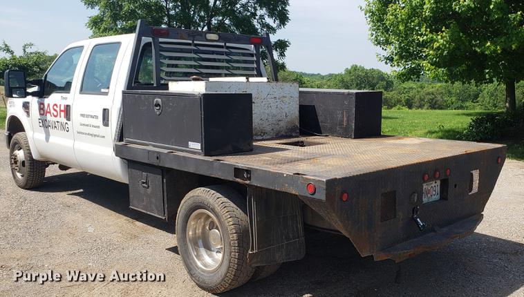 image for item EU9775 2008 Ford F350 Super Duty Crew Cab flatbed pickup truck