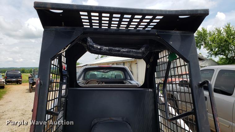 image for item EU9848 1985 Bobcat 743 skid steer with trailer