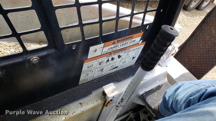 image for item EU9848 1985 Bobcat 743 skid steer with trailer