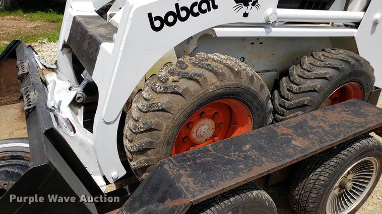 image for item EU9848 1985 Bobcat 743 skid steer with trailer
