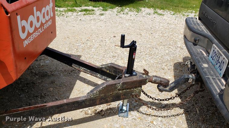 image for item EU9848 1985 Bobcat 743 skid steer with trailer