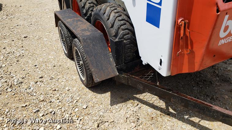 image for item EU9848 1985 Bobcat 743 skid steer with trailer
