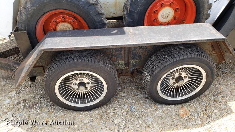 image for item EU9848 1985 Bobcat 743 skid steer with trailer