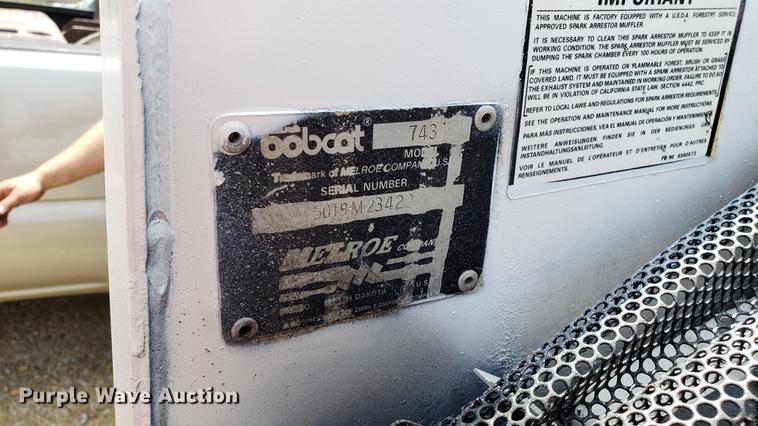 image for item EU9848 1985 Bobcat 743 skid steer with trailer