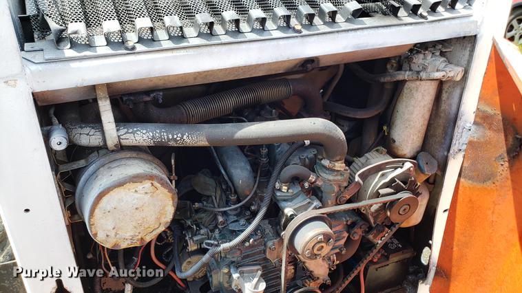 image for item EU9848 1985 Bobcat 743 skid steer with trailer