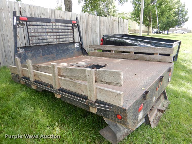 image for item FQ9883 2002 Maxwell flatbed