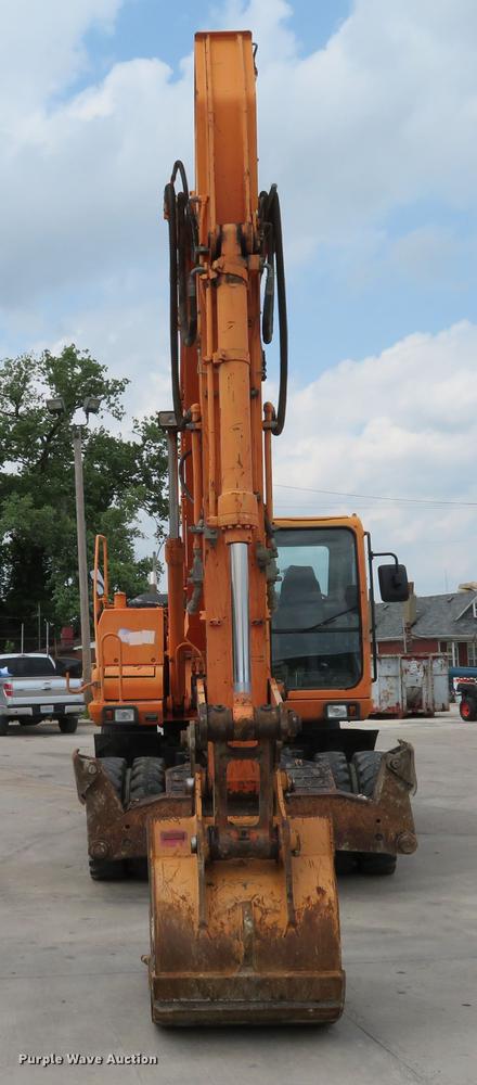 image for item DE8089 2006 Doosan Solar 210WV rubber tire excavator