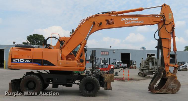 image for item DE8089 2006 Doosan Solar 210WV rubber tire excavator