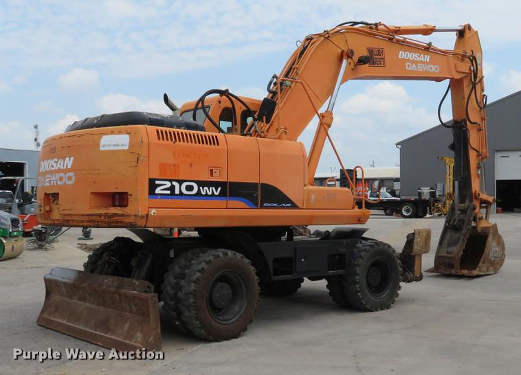 image for item DE8089 2006 Doosan Solar 210WV rubber tire excavator