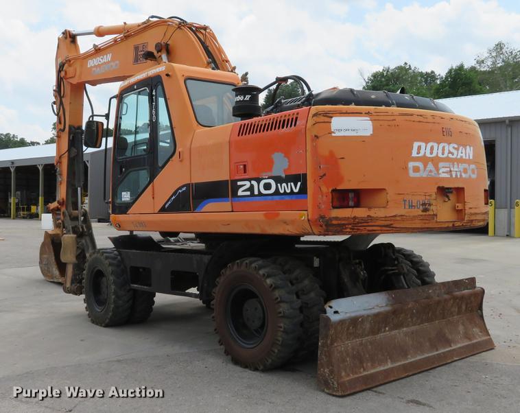 image for item DE8089 2006 Doosan Solar 210WV rubber tire excavator