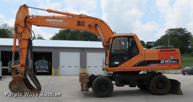 image for item DE8089 2006 Doosan Solar 210WV rubber tire excavator