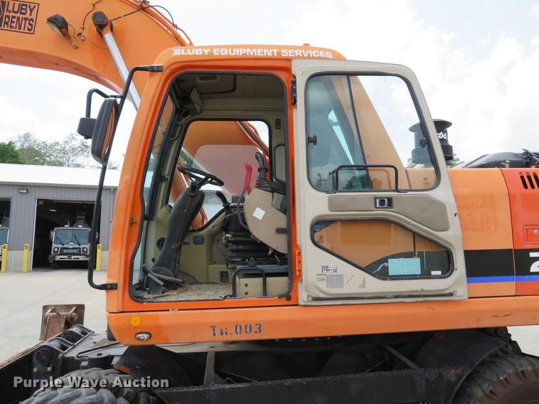 image for item DE8089 2006 Doosan Solar 210WV rubber tire excavator