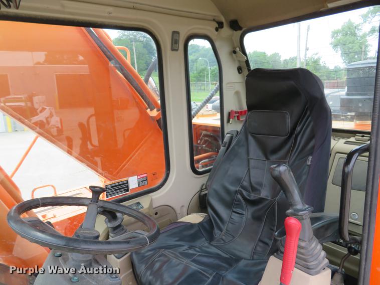 image for item DE8089 2006 Doosan Solar 210WV rubber tire excavator