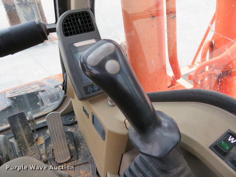 image for item DE8089 2006 Doosan Solar 210WV rubber tire excavator