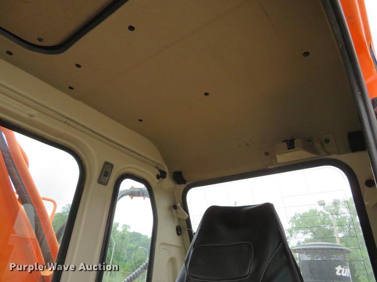 image for item DE8089 2006 Doosan Solar 210WV rubber tire excavator