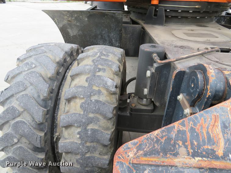 image for item DE8089 2006 Doosan Solar 210WV rubber tire excavator