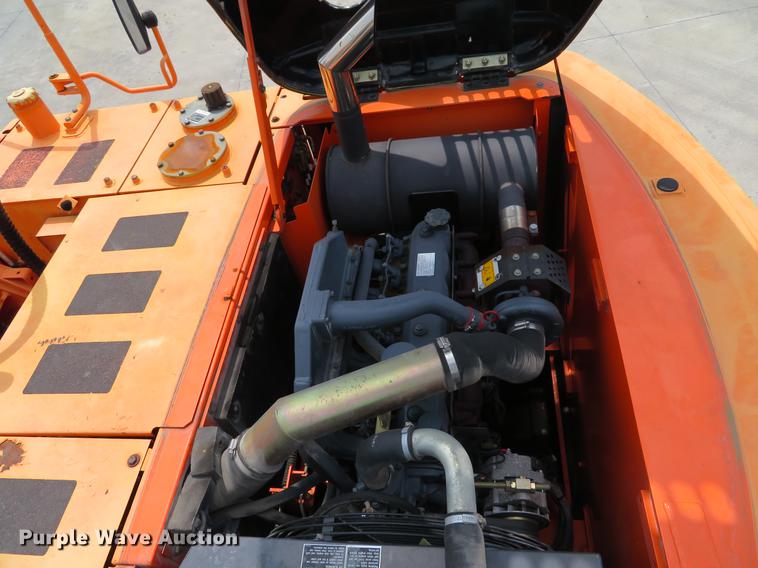 image for item DE8089 2006 Doosan Solar 210WV rubber tire excavator