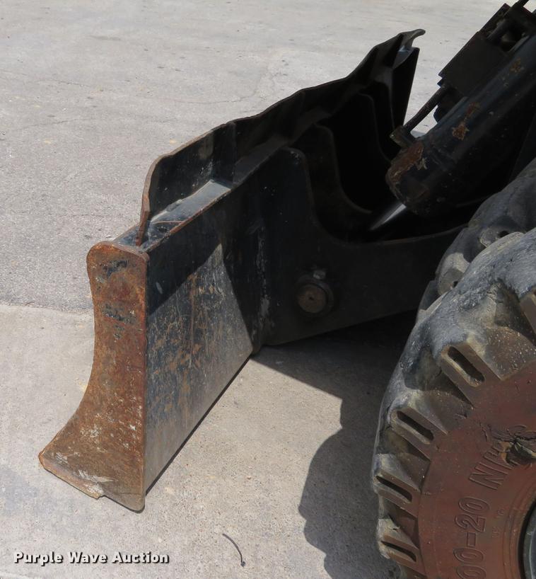 image for item DE8089 2006 Doosan Solar 210WV rubber tire excavator