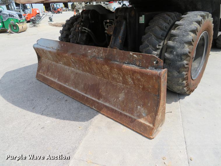 image for item DE8089 2006 Doosan Solar 210WV rubber tire excavator