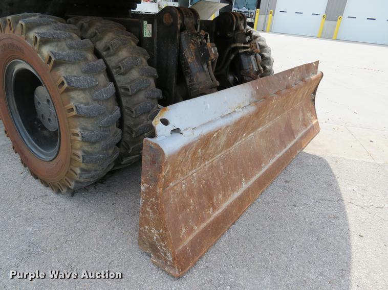 image for item DE8089 2006 Doosan Solar 210WV rubber tire excavator