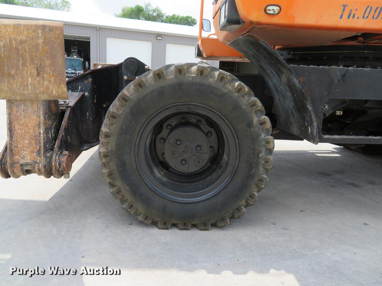 image for item DE8089 2006 Doosan Solar 210WV rubber tire excavator