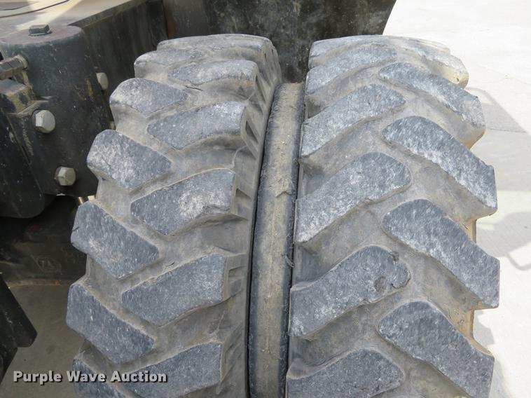 image for item DE8089 2006 Doosan Solar 210WV rubber tire excavator