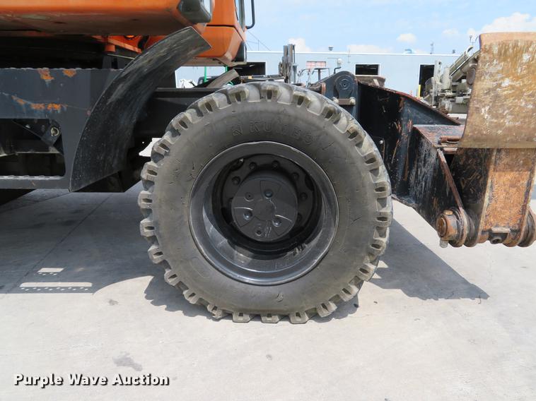 image for item DE8089 2006 Doosan Solar 210WV rubber tire excavator