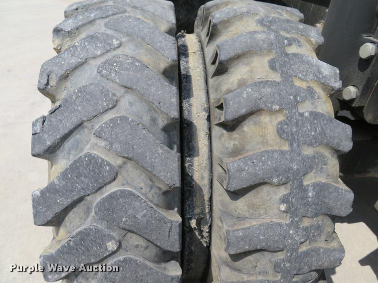 image for item DE8089 2006 Doosan Solar 210WV rubber tire excavator