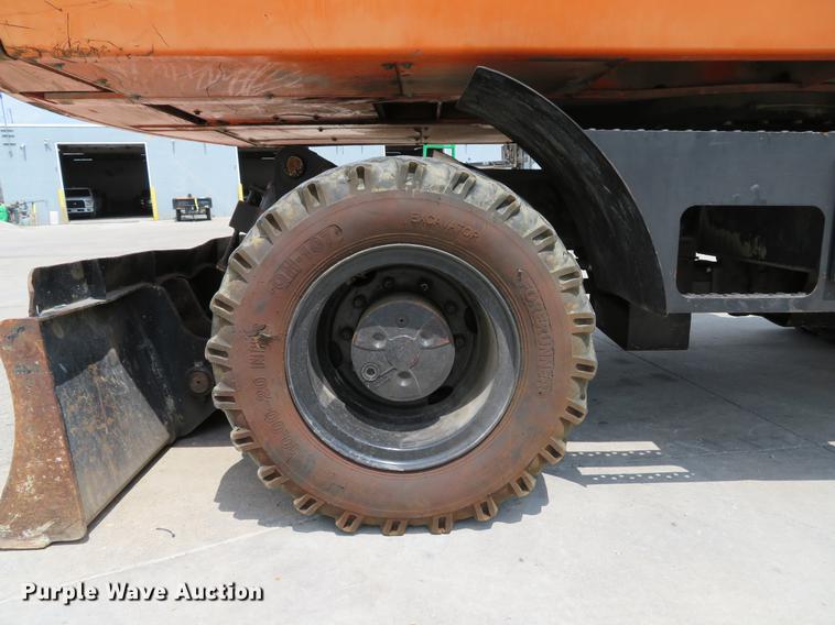 image for item DE8089 2006 Doosan Solar 210WV rubber tire excavator