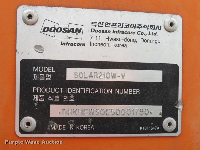 image for item DE8089 2006 Doosan Solar 210WV rubber tire excavator