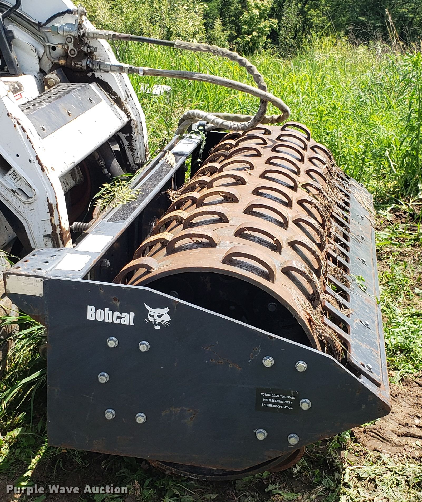 Bobcat vibratory skid steer compactor in Kansas City, MO Item EU9785 sold Purple Wave