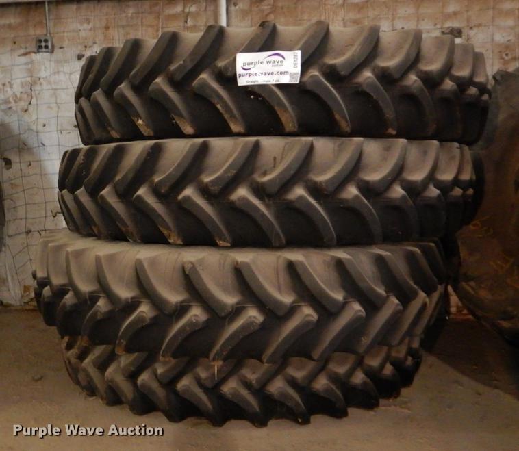 image for item DE1287 (4) Firestone 380/90R46 tires and wheels