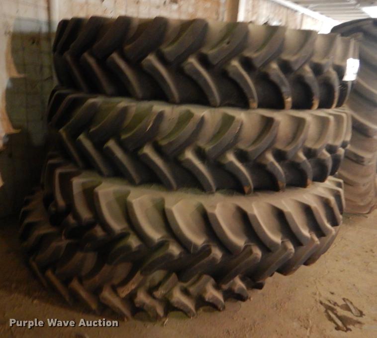 image for item DE1287 (4) Firestone 380/90R46 tires and wheels