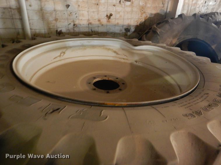 image for item DE1287 (4) Firestone 380/90R46 tires and wheels