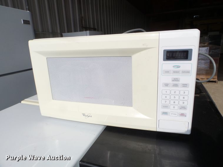 (20) Whirlpool microwaves in Des Moines, IA Item FM9395 sold Purple