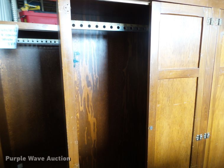 Wood wardrobe closet in Des Moines, IA Item FM9411 sold Purple Wave