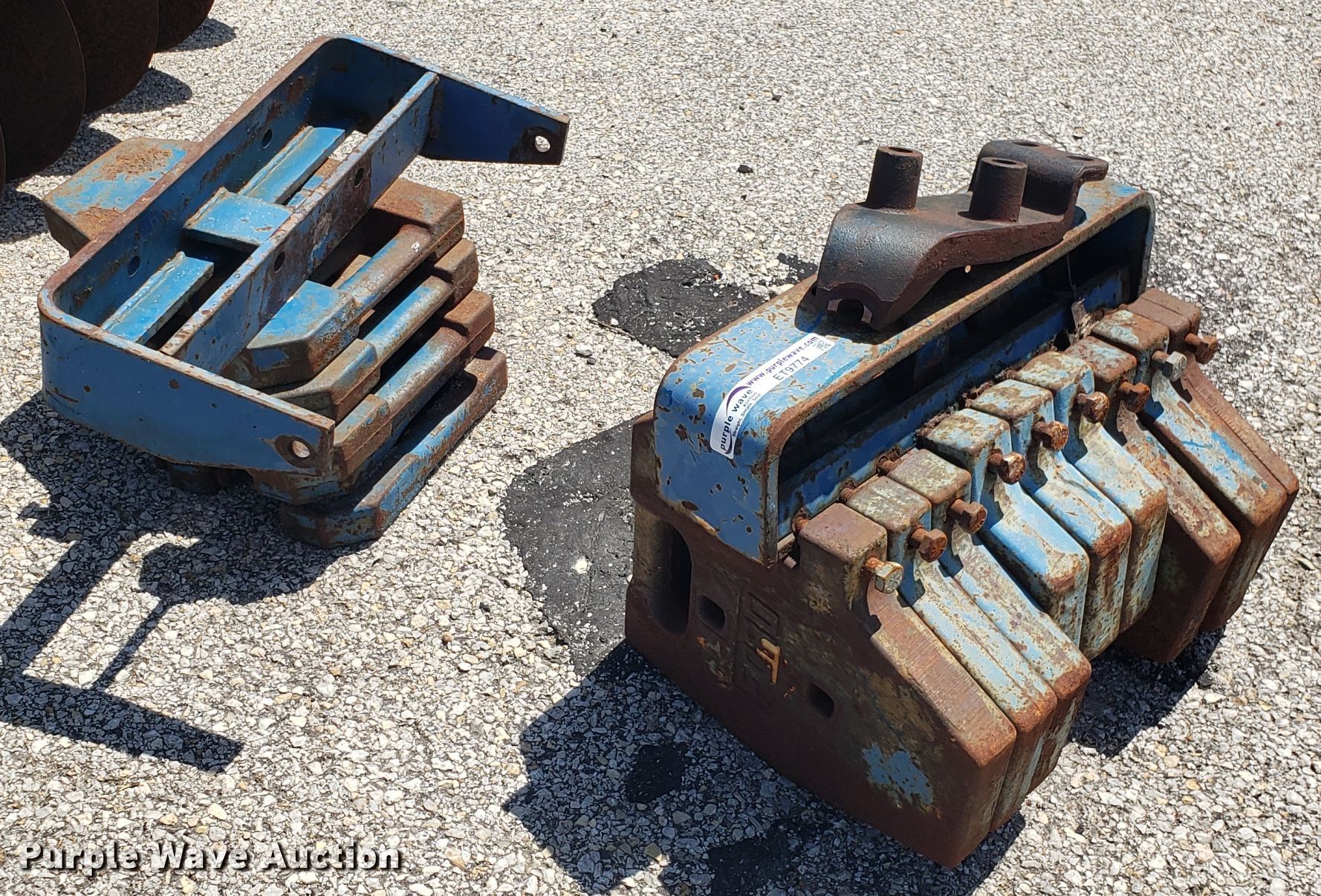(13) Ford tractor weights in Independence, MO Item ET9774 sold Purple Wave