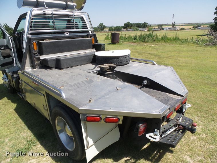 image for item DC5111 1995 GMC TopKick C6500 flatbed truck