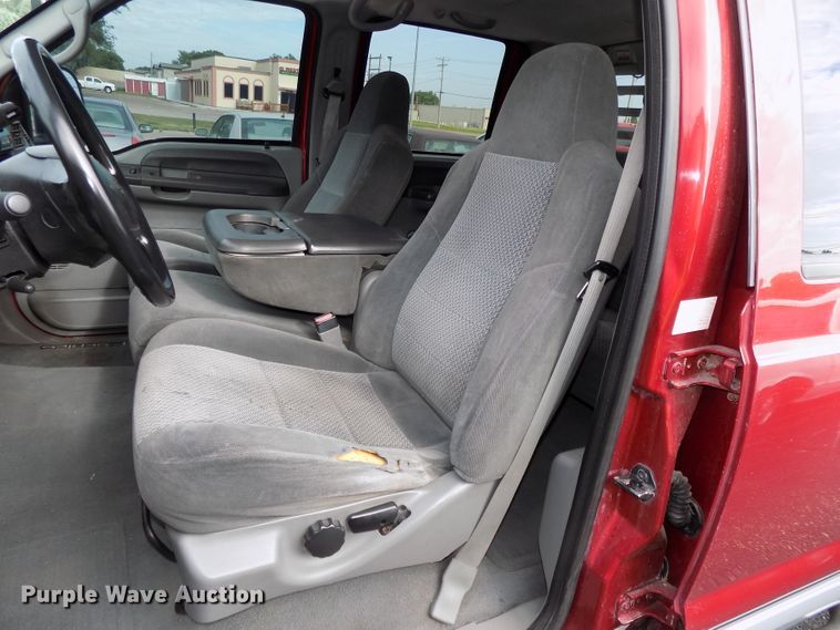 image for item DE7729 2002 Ford F250 Super Duty XLT Crew Cab flatbed pickup truck