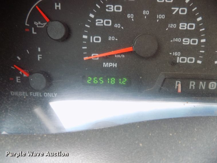 image for item DE7729 2002 Ford F250 Super Duty XLT Crew Cab flatbed pickup truck