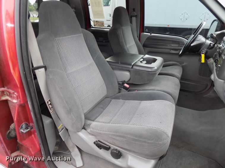 image for item DE7729 2002 Ford F250 Super Duty XLT Crew Cab flatbed pickup truck