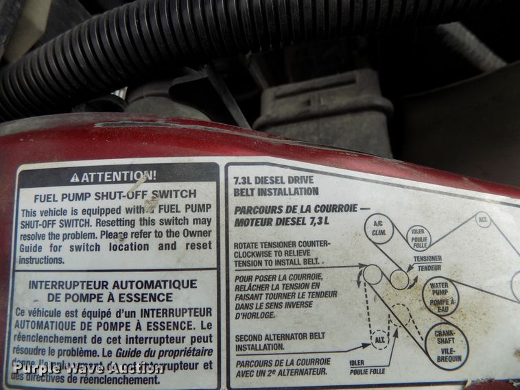 image for item DE7729 2002 Ford F250 Super Duty XLT Crew Cab flatbed pickup truck