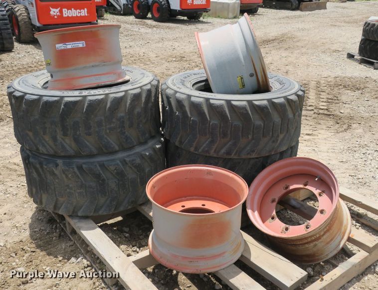 image for item EA9265 (4) 14x17.5 tires and wheels