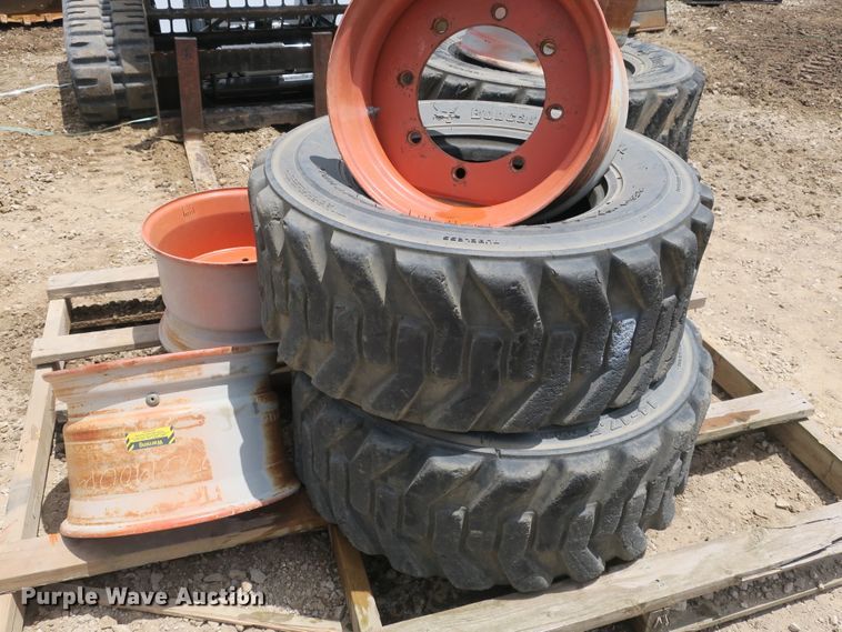 image for item EA9265 (4) 14x17.5 tires and wheels