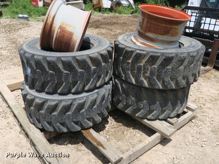 image for item EA9265 (4) 14x17.5 tires and wheels
