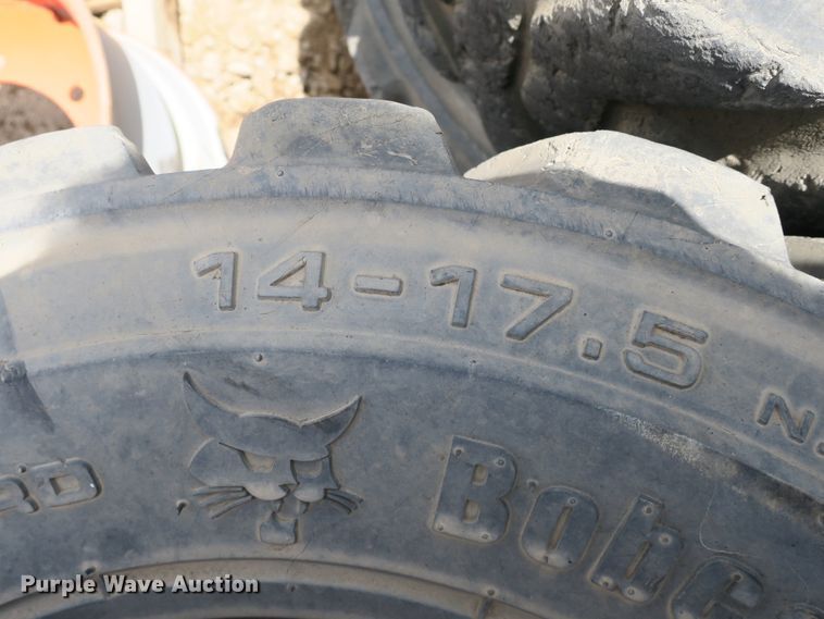 image for item EA9265 (4) 14x17.5 tires and wheels