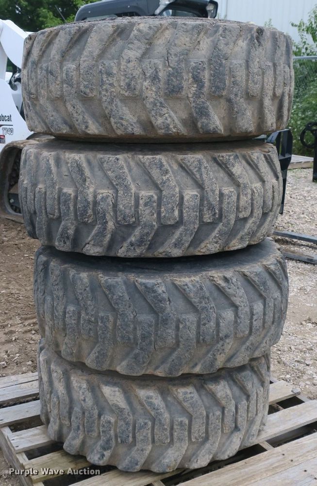 image for item EA9272 (4) 14x71.5 tires and wheels