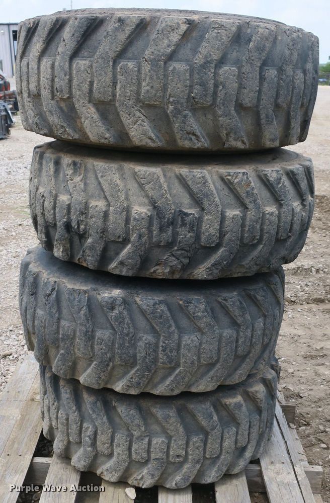 image for item EA9272 (4) 14x71.5 tires and wheels