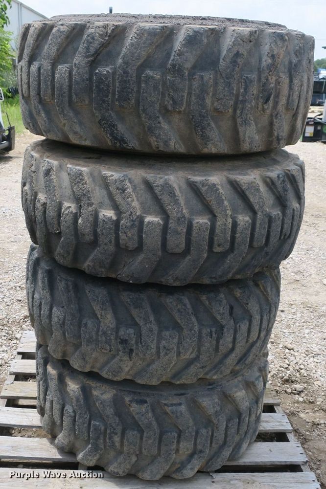 image for item EA9272 (4) 14x71.5 tires and wheels