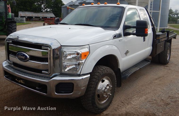 image for item ED9346 2011 Ford F350 SuperCab bale bed pickup truck